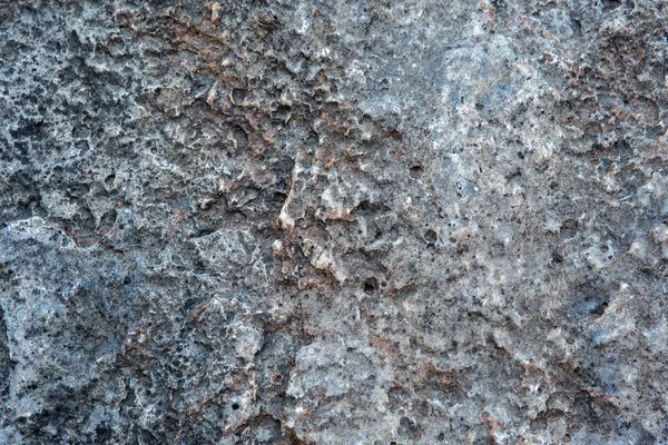 Texture of stone background. Porous stone