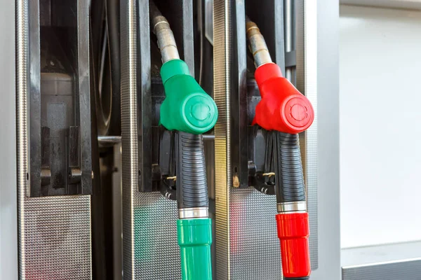 Gas pistols at a gas station close up