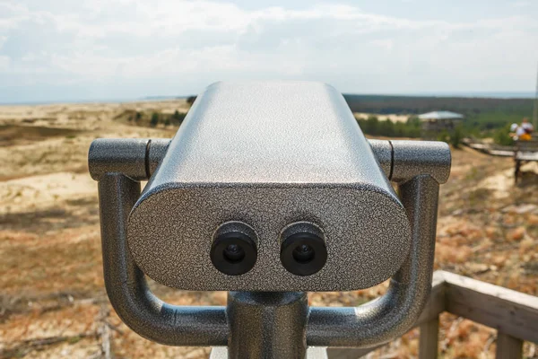 Fixed viewing binoculars on the observation platform on the Curonian spit in the Kaliningrad region