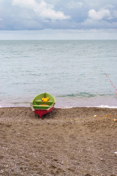 Rescue boat on the beach. Concept of rescue at sea