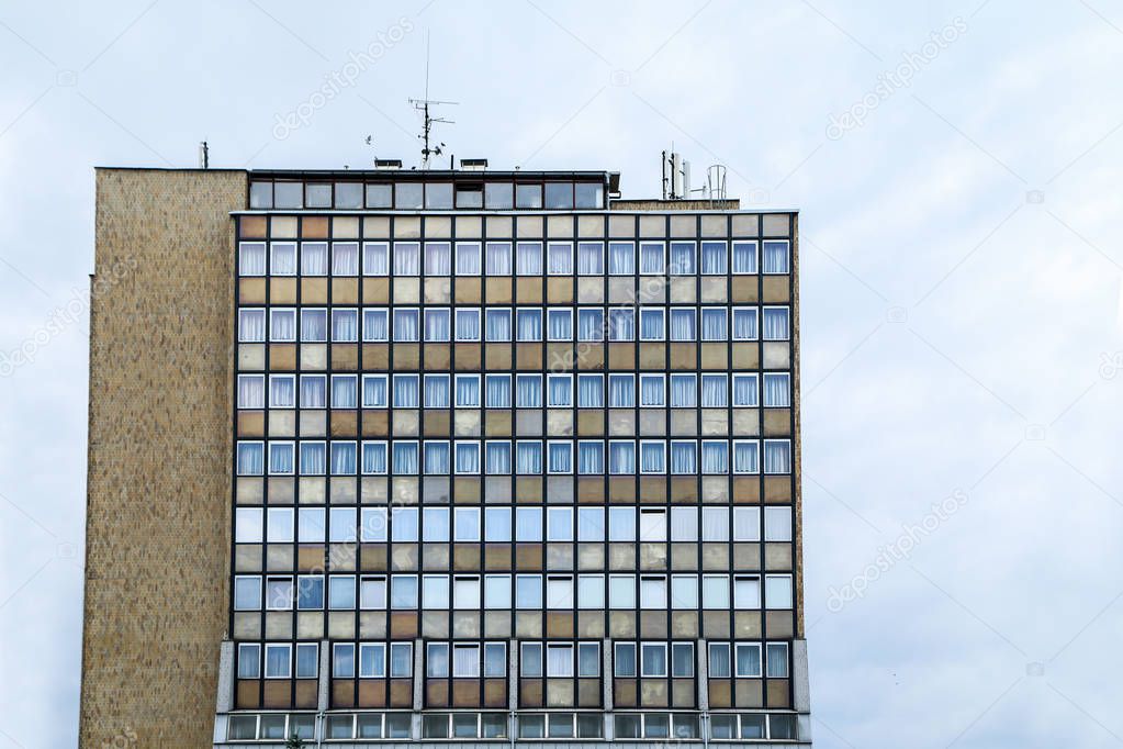 A picture of an old communist hotel. It is an illustration of the brutalist architecture of the past. 