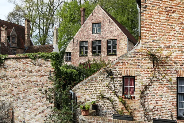 The detail of the brick houses in Bruges in Belgium. The typical colorful facades on historic houses.