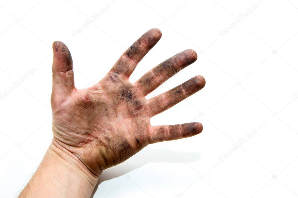 A picture of dirty hands of a man, soiled by oil and  vaseline. Isolated on a white background. 