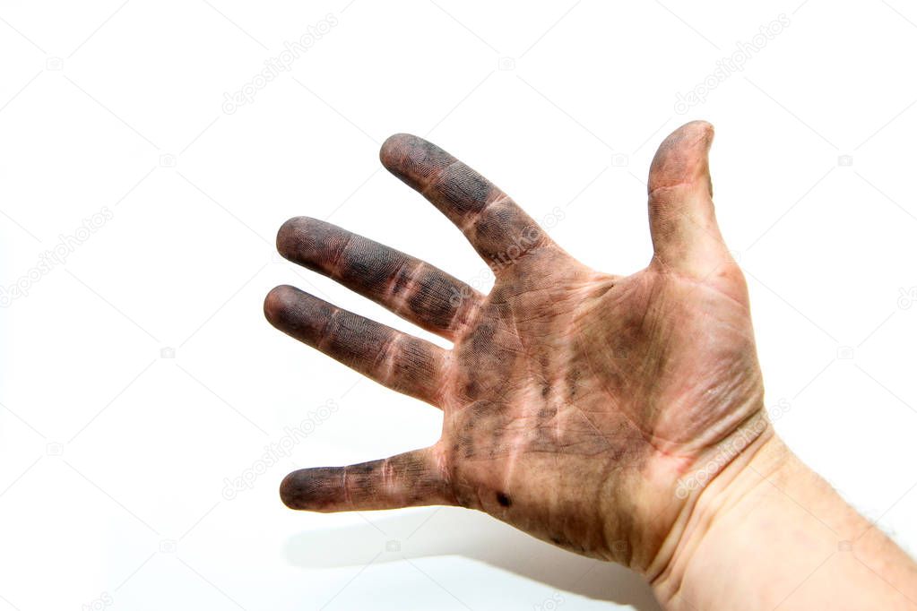 A picture of dirty hands of a man, soiled by oil and  vaseline. Isolated on a white background. 