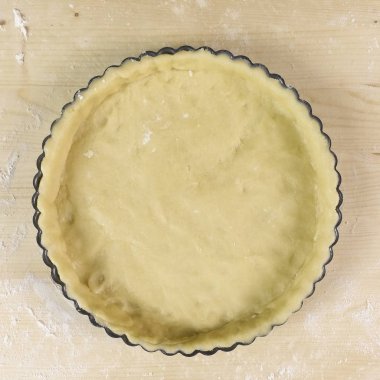 Shortcrust pasta üzerinde ahşap arka plan - üstten görünüm