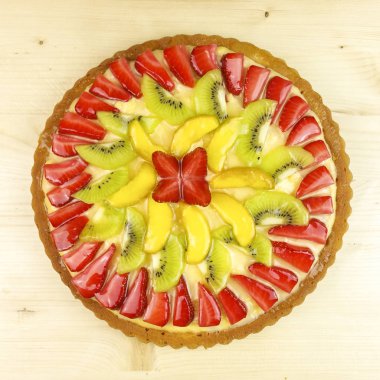 Meyve tart ahşap arka plan - üstten görünüm