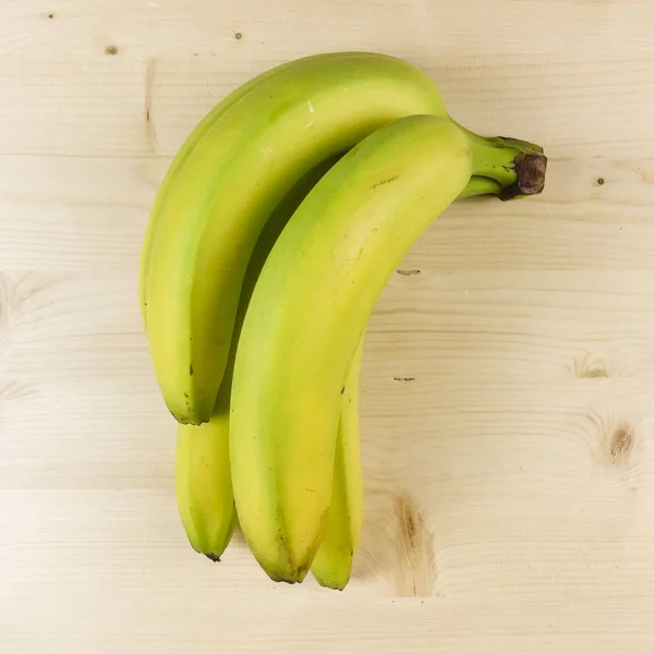 Bananas Isoladas Fundo Madeira Vista Superior — Fotografia de Stock