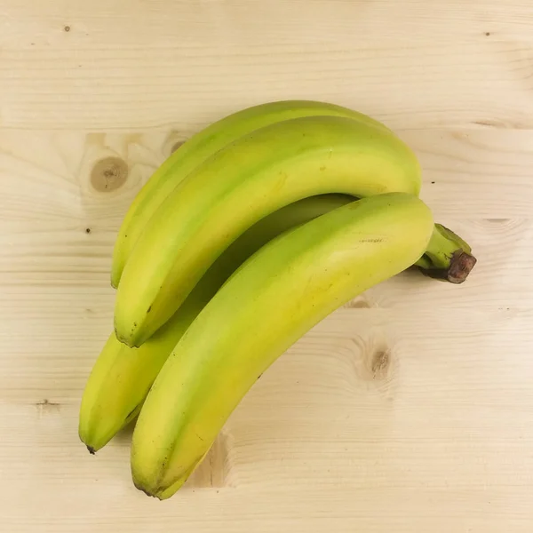 Bananas Isoladas Fundo Madeira Vista Superior — Fotografia de Stock