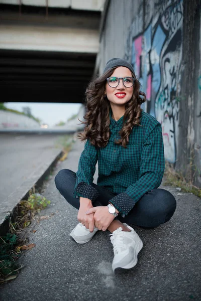 Smiling Girl Red Lips Sitting Highway Bridge Background Graffiti Curly — Stock Photo, Image