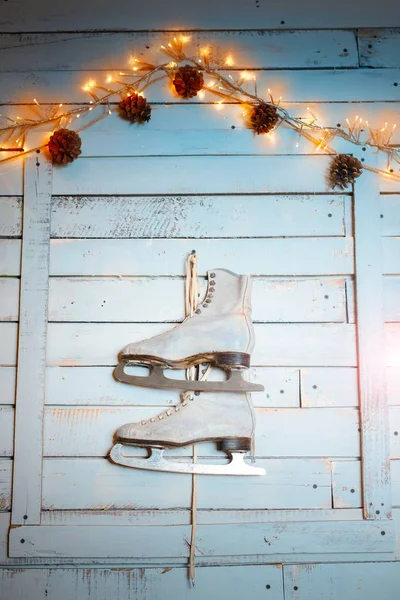 Vintage skates on the wall as a New Year\'s decor