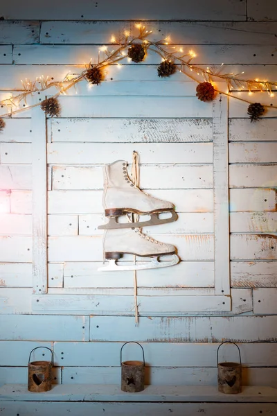 Vintage skates on the wall as a New Year\'s decor