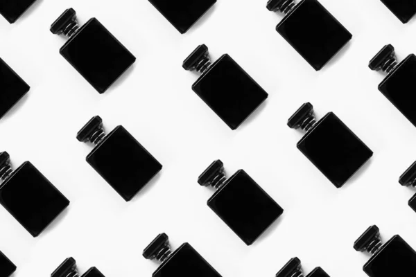 Patrón Botellas Perfume Negro Aislado Sobre Fondo Blanco — Foto de Stock