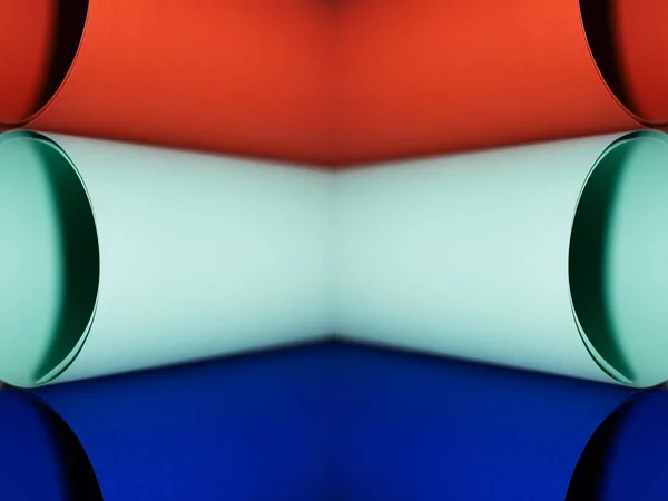 Colorful background of paper tubes. Symmetrical reflection of two photos.