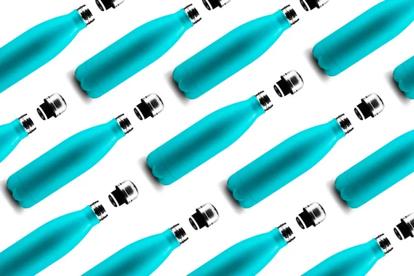 Bottles pattern. Colorful eco, reusable steel thermo water bottle of cyan color, isolated on white background. Zero waste. Say no to plastic.