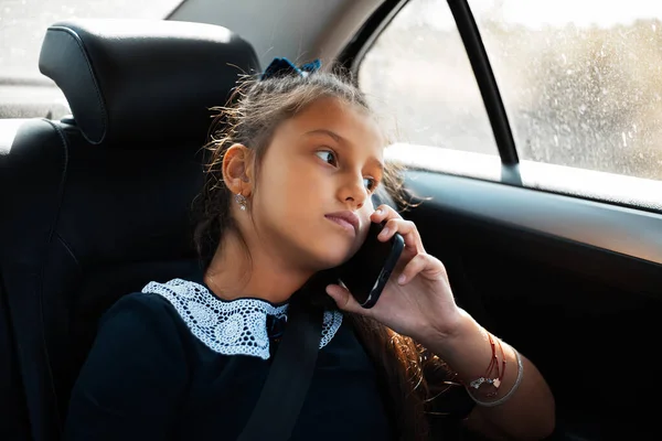 Portrait Teenage Girl Talking Smartphone Car Looking Window Wearing School — Stock Photo, Image