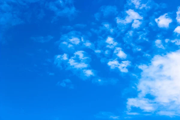 Blue sky and clouds with space for text. Blue sky and clouds. background with blue sky. Sky with small white clouds,