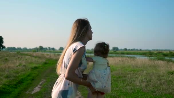 Joyful Young Mother Playing Child Holding Hands Raising Sky Summer — Stock Video