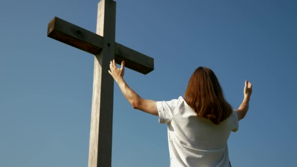 Camera Moves Christian Praying Cross Holding Hands Medium Shot Slow — Stock Video