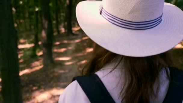 Camera Follows Caucasian Man Tourist Hiking Wood Backpack Stick Close — Stock Video