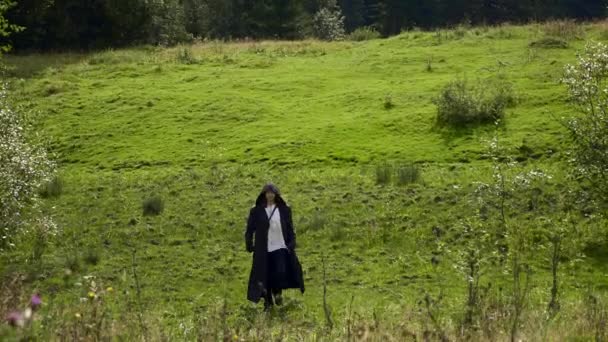 Medieval Mysterious Wandering Man Black Cloak Coat Hood Walks Forest — Stock Video