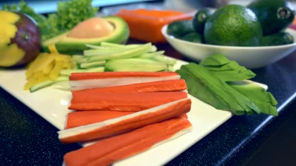 Close-up Vegetables Fruits Meat on Kitchen Table. Chef Cook Preparing Sushi At Restaurant. Food Ingredients For Cooking Meal — Stock Footage Close Vegetables Fruits Meat Kitchen Table Chef Cook Preparing Sushi Video Clip