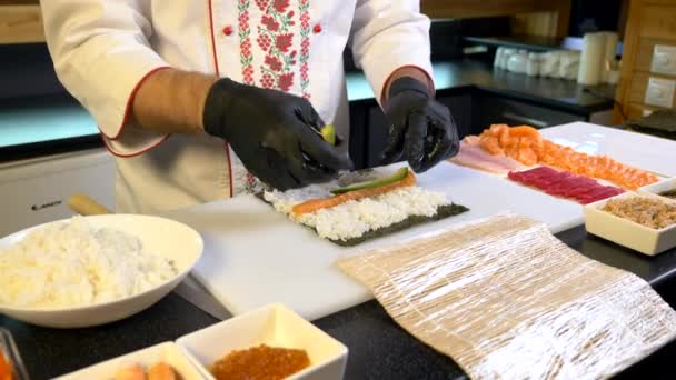 Close Hands Making Long Sushi Rolls Nigiri Japanese Cuisine Master — Stock video