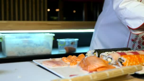 Close Hands Making Long Sushi Rolls Nigiri Japanese Cuisine Master — 图库视频影像