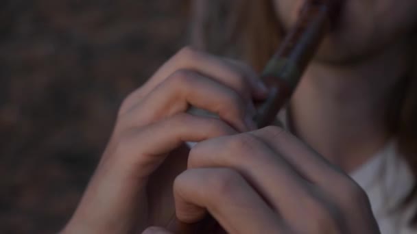 Close Medieval Ethnic Musician Man Long Hair Plays Flute Wood — Stock Video