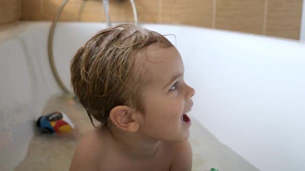 Boy Enjoys Bathing Bathtub Mother Washing Child Bathroom Slow Motion — Stock Video