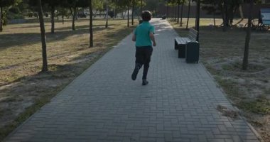 Teenage Boy Run in Park