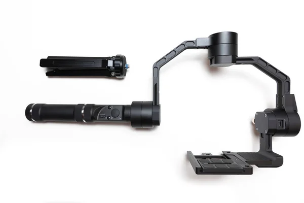 DSLR kamera titreşimli üç eksenli motorlu dengeleyici sistemi beyaz arka planda, izole edilmiş