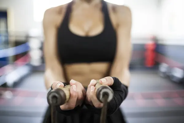 Faceless Muscular Woman Holding Wooden Jump Rope — Stock Photo, Image