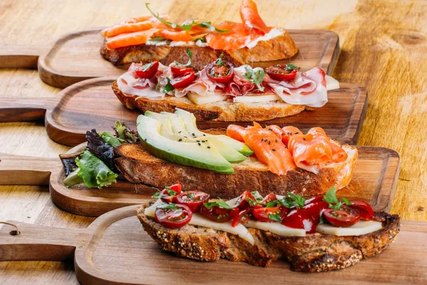 Assortment Nutritious Different Sandwiches Wooden Board — Stock Photo, Image