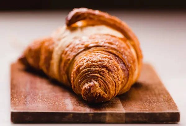 Close Delicious Freshly Baked Golden Croissant Crust Wooden Board — Stock Photo, Image