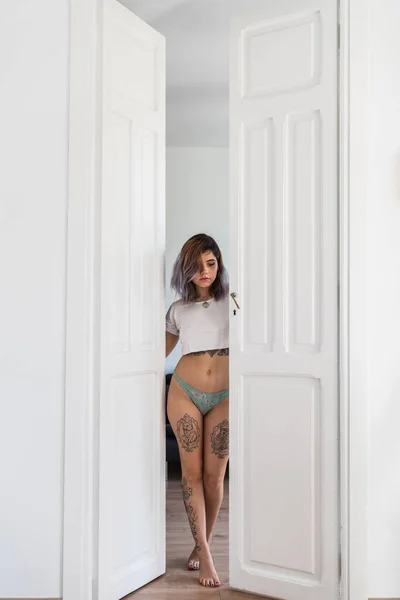 Tattooed Woman Panties Shirt Standing Doorway Closing Doors Stylish Apartment — Stock Photo, Image