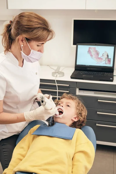 Woman Mask Doctor Uniform Making Scan Teeth Little Boy While — Stock Photo, Image