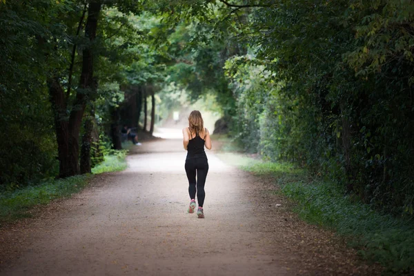 Young Fit Woman Running Away Doing Sport Path Park Sunny — Stock Photo, Image