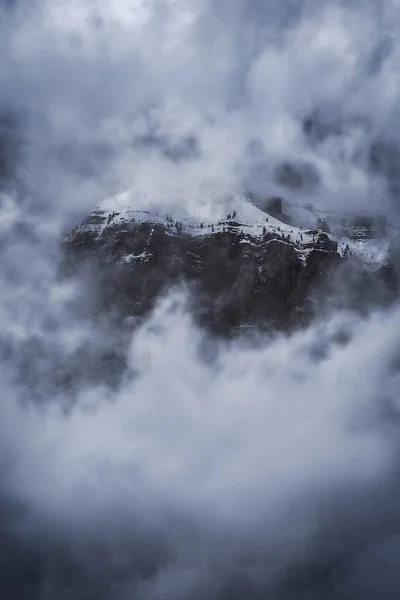 Sharp Mountain Peaks Covered Partially Snow Surrounded Misty Fog Cloudy — Stock Photo, Image