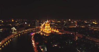 Night aerial view. Moscow City. View from above. City lights. Night panoramic shot on spring. Summer