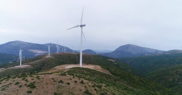 Aerial View. Beautiful windmill turbines , wind energy turbines . Aerial drone shot. 4K 50fps — Stock Video