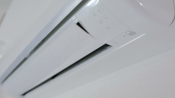 Activation and operation of the air conditioner. Turning the impeller of the outdoor unit — Stock Footage Activation and operation of the air conditioner. Turning the impeller of the outdoor unit Royalty Free Stock Video