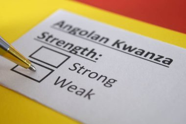 Bir kişi Angolan Kwanza 'nın gücü ile ilgili soruya cevap veriyor..