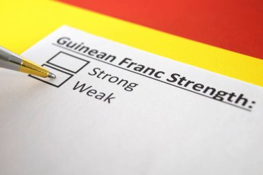 Bir kişi, Gine Frangı 'nın gücü hakkındaki soruları yanıtlıyor..