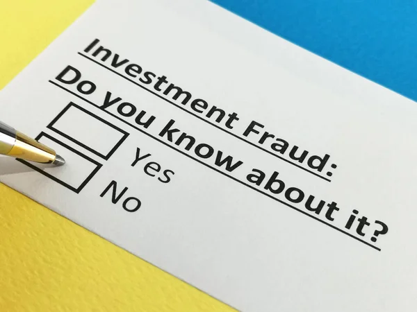 One person is answering question about investment fraud.