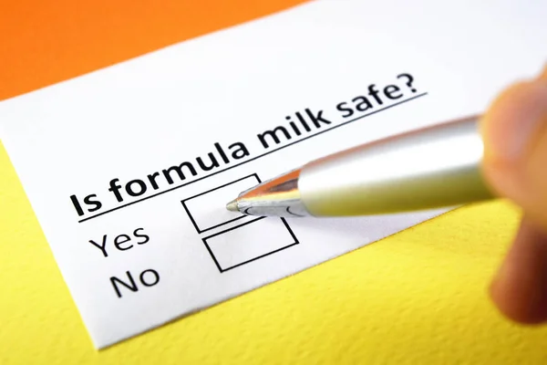 A person is answering question about formula milk.