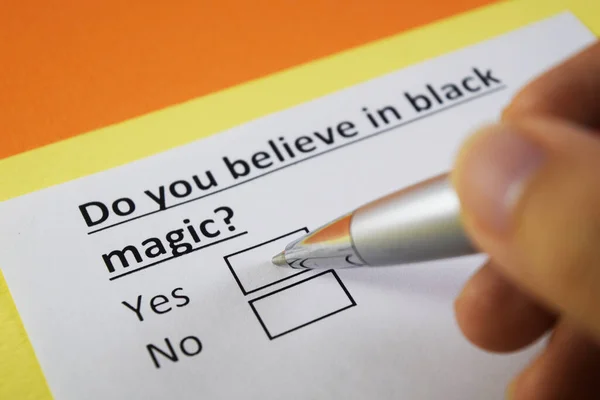 A person is answering question about black magic.