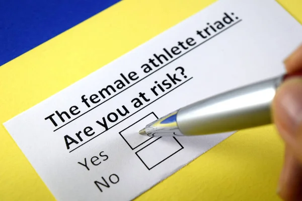 Una Persona Está Respondiendo Pregunta Sobre Tríada Atleta Femenina — Foto de Stock
