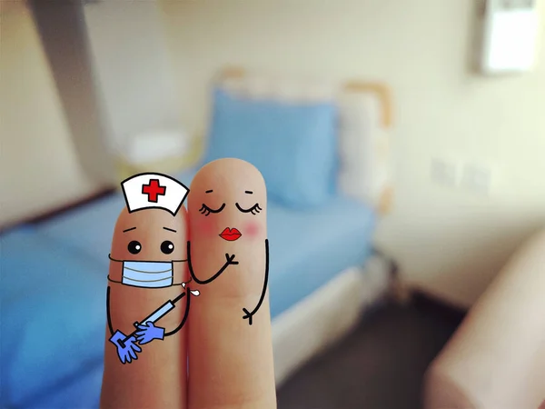 Dois Dedos São Decorados Como Duas Pessoas Uma Delas Enfermeira — Fotografia de Stock