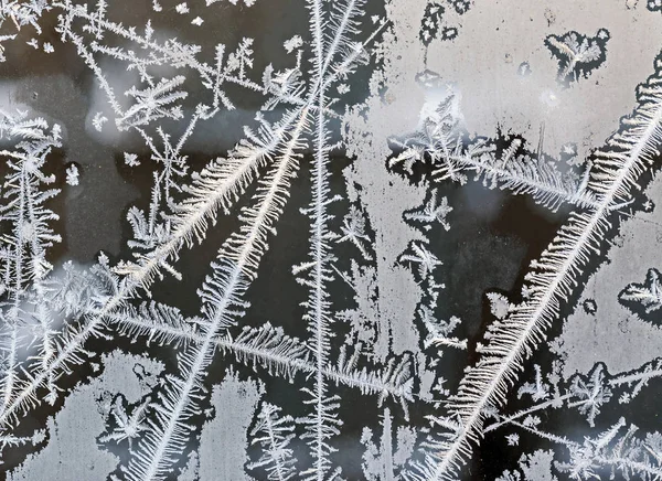 Schnittpunkt zur Frostlinie, Muster auf dem Fensterglas — Stockfoto