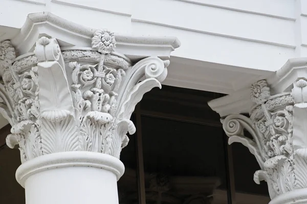 decoration of the top of the column in the antique style on the building of the city organ hall